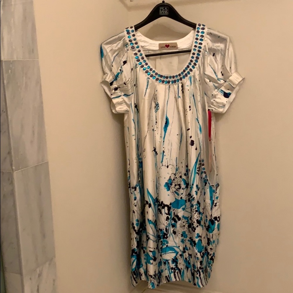 Love Token Dress, NWT. Dress up down with pockets